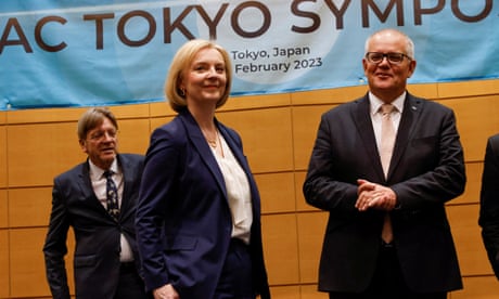Liz Truss with Guy Verhofstadt (left) and Scott Morrison at a symposium of  the Inter-Parliamentary Alliance on China, in Tokyo, Japan