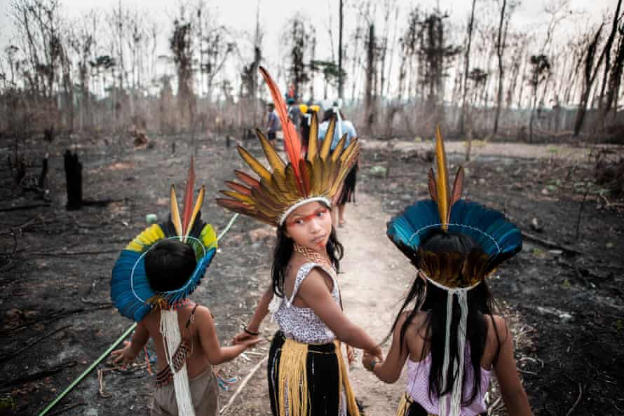 Children from the Huni Kuin tribe on land ravaged by the 2019 Amazon fires.