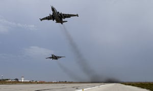 Russian Sukhoi Su-25 fighter jets take off from the Hmeymim air base near Latakia, Syria, on 22 October.