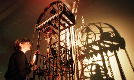 Woman with metal kinetic sculpture