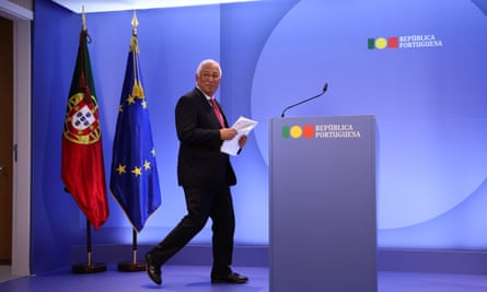 Practical not political … Portugal’s outgoing prime minister António Costa with the flag and the symbol in their separate settings.