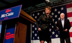 Former Alaska Governor Sarah Palin (L) talks to supporters during a campaign rally for Sen. John McCain (R-AZ) at Pima County Fairgrounds on March 2010 in Tucson, Arizona.
