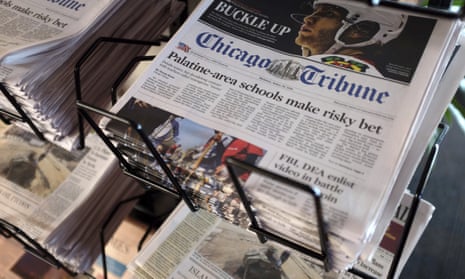 Stacks of newspapers on a rack