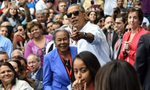 Barack Obama gestures next to Rachel Robinson, the widow of Jackie.