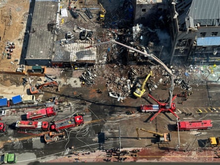 Firefighters work the scene of an explosion in northern China’s Hebei province