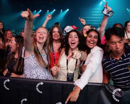 A crowd dances at a Turning Point summit in Tampa, Florida.