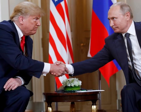 US president Donald Trump, left, and Russian president Vladimir Putin shake hands at the beginning of a meeting at the Presidential Palace in Helsinki, Finland in 2018.