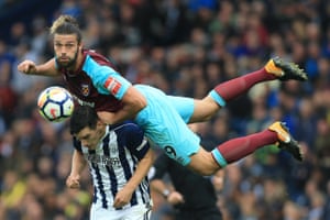 West Ham’s Andy Carroll climbs all over West Brom’s Gareth Barry as neither team managed to score at the The Hawthorns.