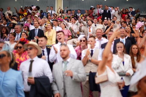 Racegoers watching the horses they backed in the Hardwicke Stakes.