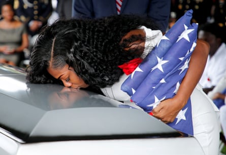 Myeshia Johnson, widow of one of US soldiers killed, kisses coffin