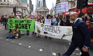 Extinction Rebellion protesters block the junction at Bank station.
