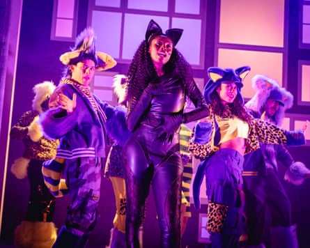 People on stage dressed in costumes including cat ears and leopard print in Lovestuck