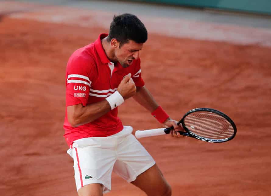 Novak Djokovic celebrates winning his 19th Grand Slam.