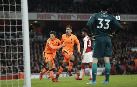 Cech dejected as Firmino celebrates with Coutinho.