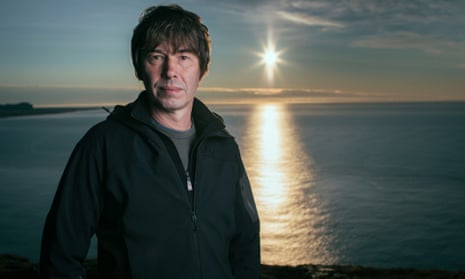 Professor Brian Cox on the cliffs of southern Iceland as the sun rises. 