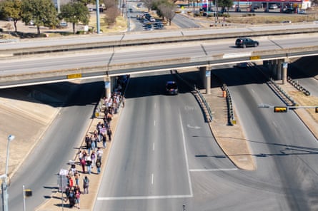 aerial view of students walking along a road