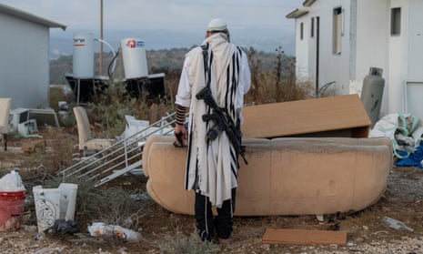 A Jewish settler prays in the Eviatar outpost in the Israeli-occupied West Bank during morning prayers calling for the legalisation of the outpost. 