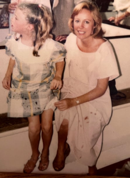 The girl and her mother in dresses splattered with cherry juice