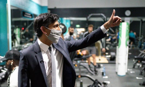 Rishi Sunak gives a thumbs up during a visit to gym