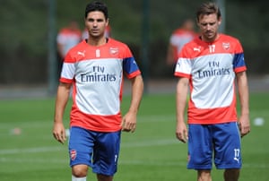 Mikel Arteta and Nacho Monreal during an Arsenal training session in 2014