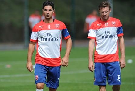 Mikel Arteta and Nacho Monreal during an Arsenal training session in 2014
