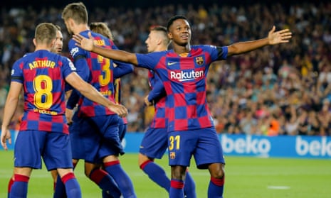 Ansu Fati celebrates after scoring the opening goal for Barcelona against Valencia.