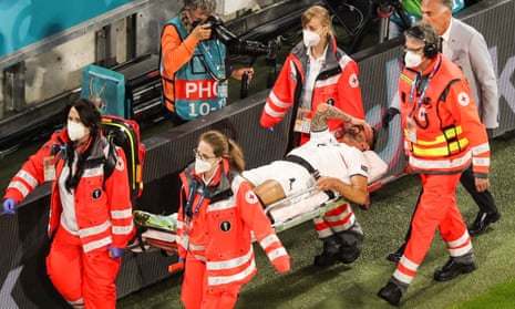 Italy’s Leonardo Spinazzola is carried away on a stretcher after suffering his achilles injury in the Euro 2020 win over Belgium.