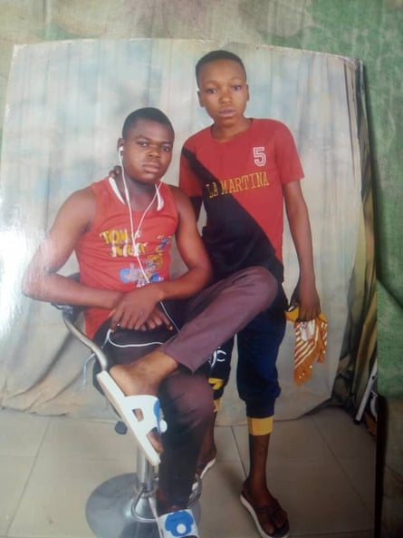 David Nwamini (right) and Chukwudi as young boys.