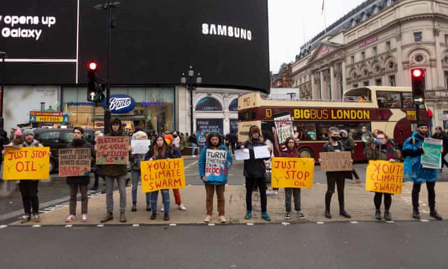 Just Stop Oil protesters at Piccadilly Circus, London, during the youth climate strike in December.