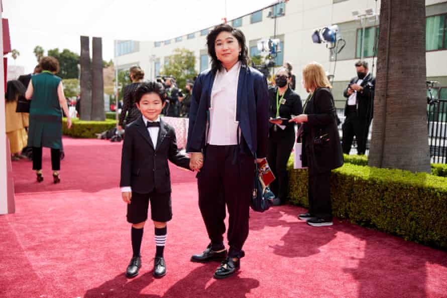 Tailored shorts … Minari star Alan Kim with producer Christina Oh.