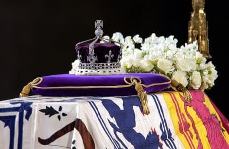 The queen mother's coronation crown bearing the Koh-i-noor diamond sits on top of her coffin