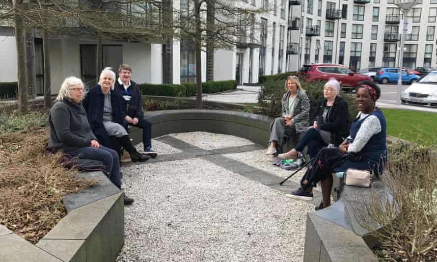 Ros Napier, second left, and her friends in the courtyard of their apartments in Birmingham.