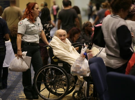 Joel OlsteenEvacuee Teddy Gifford, 90, waits for a medical evaluation with first responder Veronica Garza at the Lakewood Church in Houston, Texas, Tuesday, Aug. 29, 2017. Joel Olsteen and his congregation have set up their church as a shelter for evacuees from the flooding by Tropical Storm Harvey. (AP Photo/LM Otero)