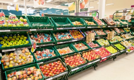 Apples inthe fruit aisle at a Tesco supermarket