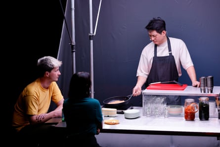 Jaha Koo cooks for theatregoers while he performs