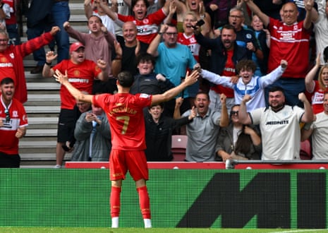 Middlesbrough's Will Lankshear celebrates scoring with the fans.