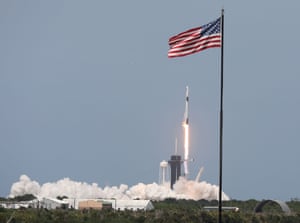 The SpaceX Falcon 9 rocket carrying the Crew Dragon spacecraft lifts off on Saturday