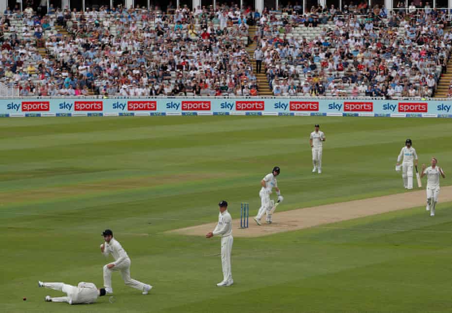 Olly Stone (right) reacts after Joe Root (left) dropped Will Young.