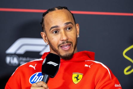 Lewis Hamilton talks to the media.