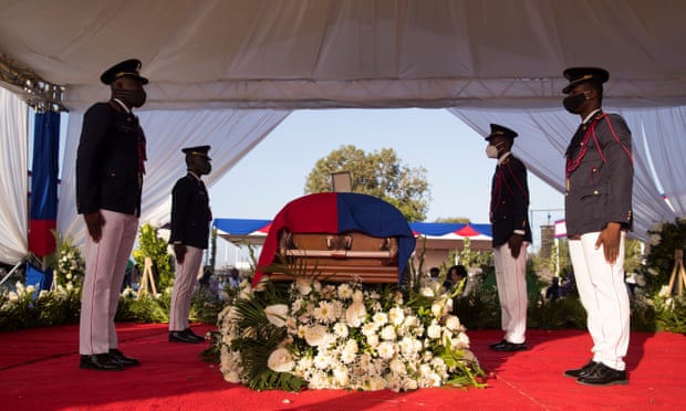 Police officers guard the coffin at the beginning of the ceremony. haiti,Moïse’s funeral,Haitian president Jovenel Moïse,Moïse’s widow,Martine Moïse,harbouchanews