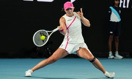 Iga Swiatek of Poland plays a forehand in her second round victory over Danielle Collins.