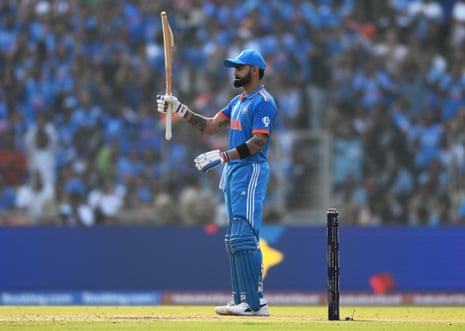 Virat Kohli brings up a much-needed fifty for India.