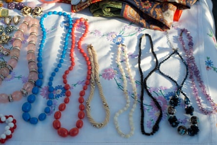 Various coloured necklaces on a table