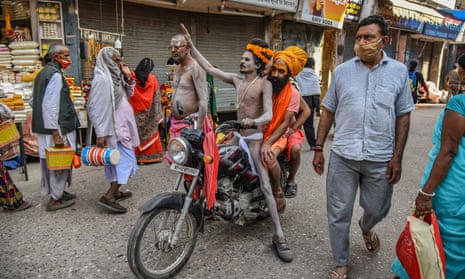 Indian holy men on their way to the Ganges River during the Kumbh Mela at Haridwar, Uttarakhand.