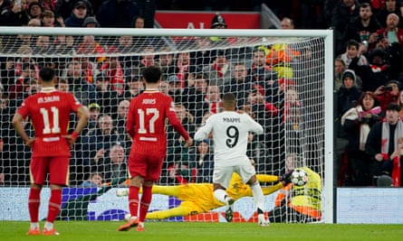 Caoimhin Kelleher saves Kylian Mbappé’s second-half penalty.