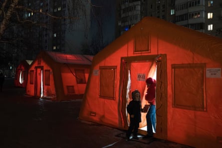 A tent is set up in a Kyiv neighbourhood where people can warm up after Russian air attacks.