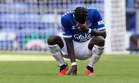 Everton’s Amadou Onana looks dejected after the final whistle.