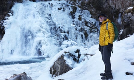 Kevin Rushby by a frozen waterfall in the Ahrntal valley.