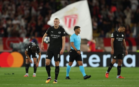 Erling Haaland of Manchester City shows a look of dejection after Jordan Teze of Monaco scores a goal to make the score 1-1.