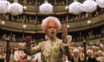 Tom Hulce, as Mozart, seen conducting in front of a packed theatre, in Milos Forman’s Amadeus. The 1984 film won eight Oscars.